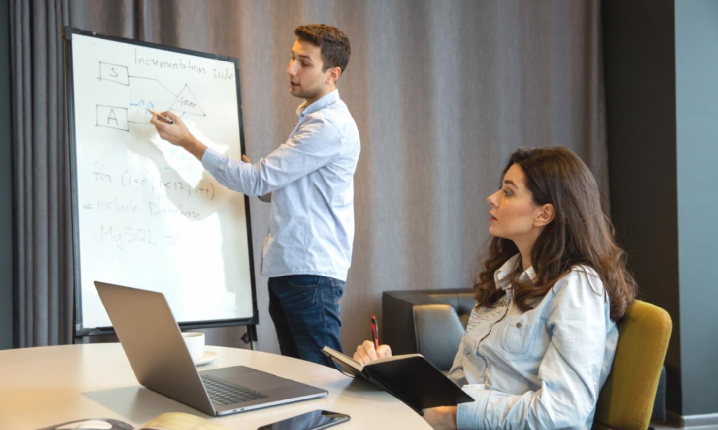 Professional business meeting with financial experts collaborating on analysis projects